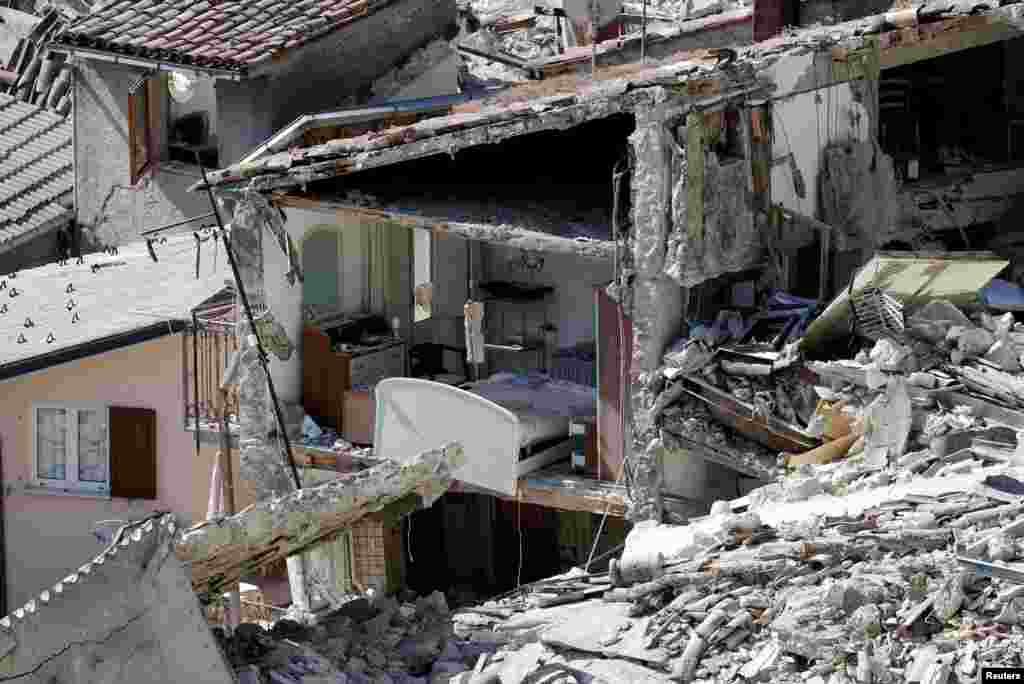 The interior of a damaged house is seen following an earthquake at Pescara del Tronto in central Italy on August 24. More than 250 people were killed in the 6.2-magnitude quake. (Reuters/Max Rossi)