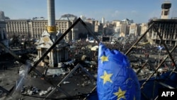 Antigovernment protesters gather on Independence square in central Kyiv on February 21. Will the new agreement convince them to clear the square?