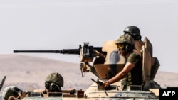 Turkish soldiers in the Turkish-Syrian border city of Karkamis on August 27.