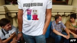 A Pussy Riot supporter wears a T-shirt in Moscow in August.