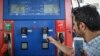 A man using his fuel card in a gas station in Tehran, on July 10, 2018. File photo