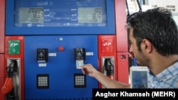 A man using his fuel card in a gas station in Tehran, on July 10, 2018. File photo