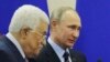 Russian President Vladimir Putin (right) and Palestinian President Mahmud Abbas after a meeting in Sochi in May 2017