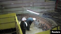 Russians work at the Iranian nuclear power plant in Bushehr in 2009.