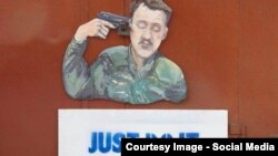 Caricatură la Donețk înfățișîndu-l pe liderul separatiștilor pro-ruși Igor Girkin (alias Strelkov)