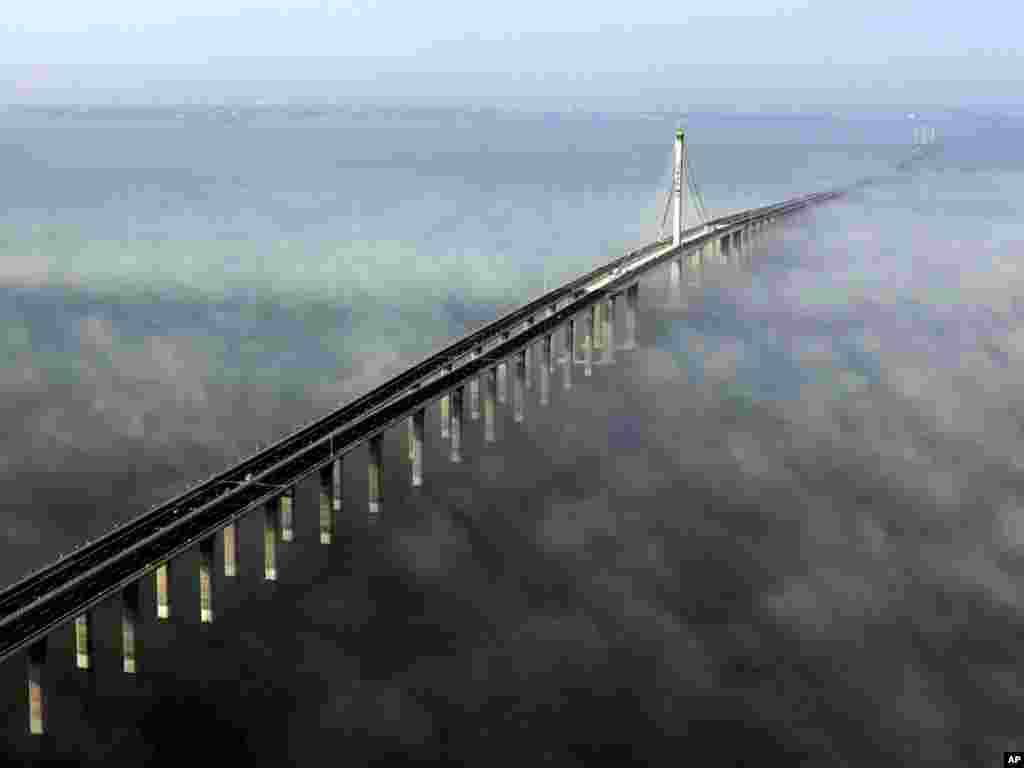 The Jiaozhou Bay Bridge in Qingdao, eastern China, opened on June 30. At 42 kilometers, it is the world's longest cross-sea bridge. Photo by Yan Runbo for AP