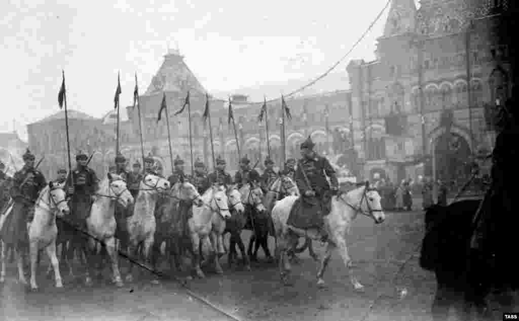 A parade of Red Army soldiers in Moscow. After Bolshevik revolutionaries gained power in 1917, then quit World War I, they reportedly seized thousands of the unused caps from the tsar's depots...