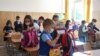 First grade students participate to class, on the first day of school, at Orizont Secondary School in Bucharest.