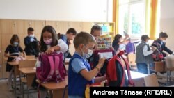 First grade students participate to class, on the first day of school, at Orizont Secondary School in Bucharest.