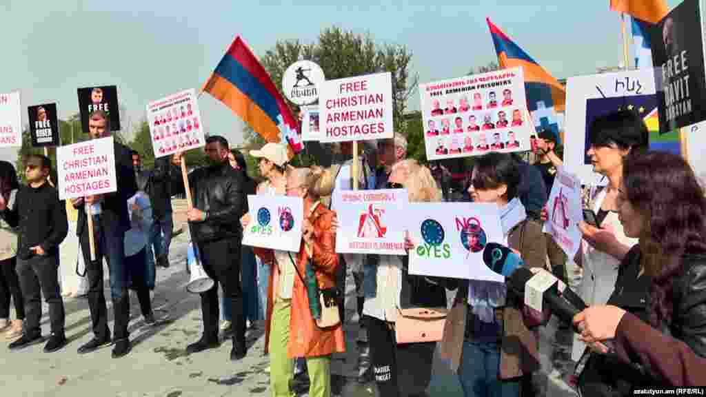 A protest held near Yerevan's Demirchian Arena on May 4.The group were drawing attention to the plight of ethnic Armenian prisoners held in Azerbaijan in the wake of Baku's recapture of Nagorno-Karabakh and surrounding regions.
