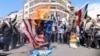 Иранци горят знамената на Израел и САЩ в Техеран, 5 април 2024 г.