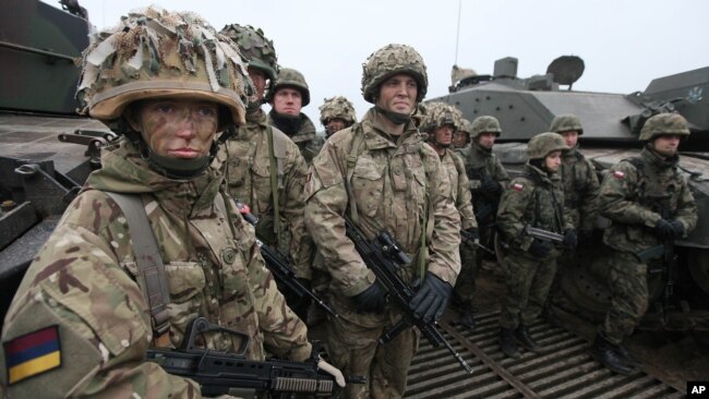 British soldiers take part in a joint military exercise with Polish troops in 2014 in response to Russia's aggressions.
