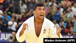 AZERBAIJAN -- Iran's Saeid Mollaei jubilates after winning in the men under 81kg category bout of the 2018 Judo World Championships in Baku, September 23, 2018