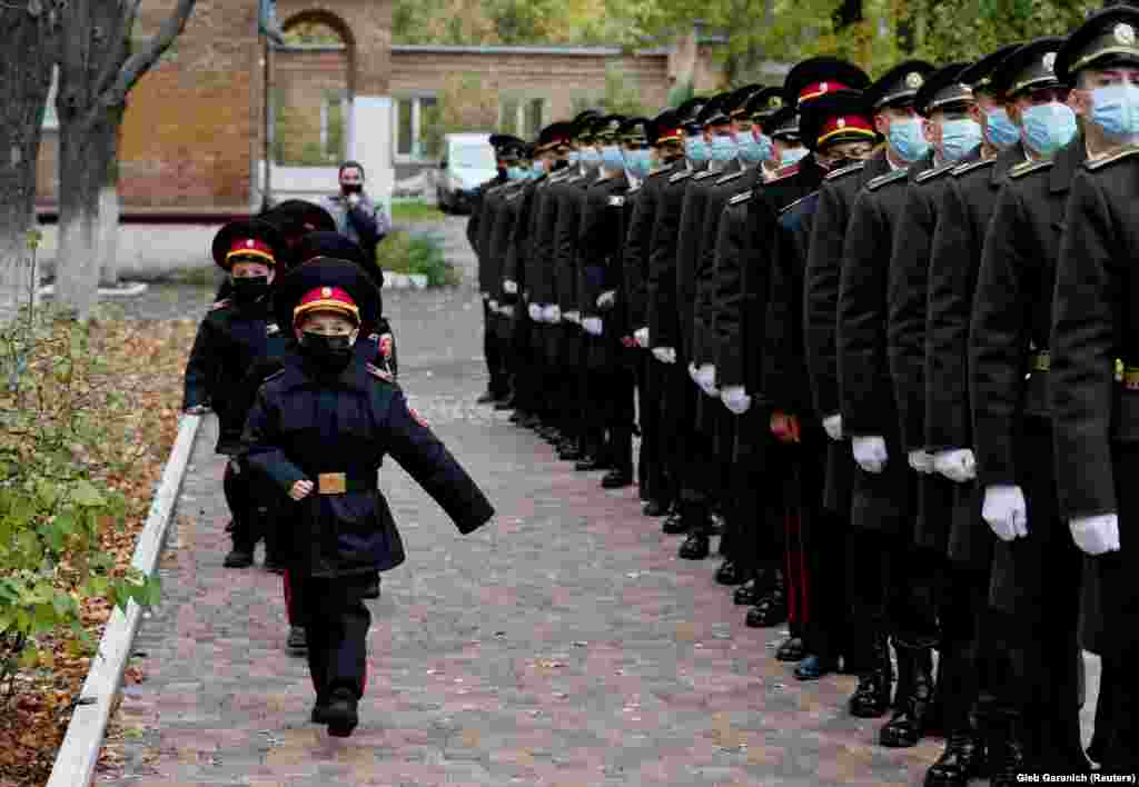 Young Ukrainian military cadets take part in a ceremony to receive their shoulder insignia on November 6. (Reuters/Gleb Garanich)