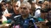 Armenia - General Hunan Poghosian, the first deputy chief of the Armenian police, speaks to reporters near a police building in Yerevan seized by anti-government gunmen, 17Jul2016.