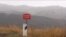 Armenia- A sign in Tavush province warning of cross-border gunfire from Azerbaijan. 