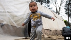 A refugee toddler at a makeshift camp near the Greek-Macedonian border near the Greek village of Idomeni, Greece, in March.