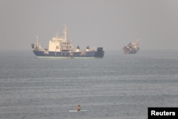 Vessels in the Strait of Hormuz near the beach of Bandar Abbas, Iran (file photo)