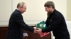 Russian President Vladimir Putin (left) meets with Chechen strongman Ramzan Kadyrov near Moscow in June 2018.