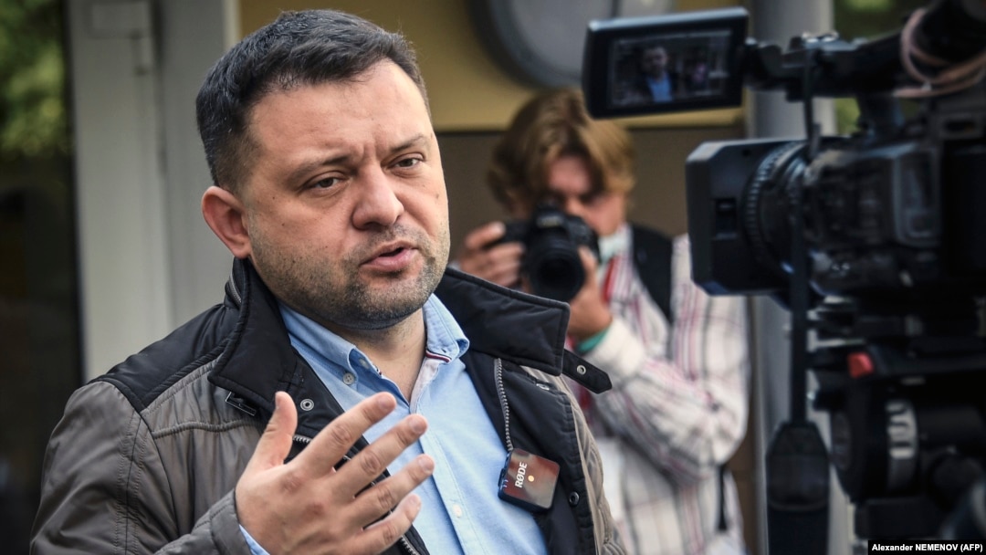 Sergei Boiko, the head of Aleksei Navalny's Novosibirsk headquarters and a City Council candidate, talks to the media in front of a polling station in Novosibirsk on September 13, 2020. 