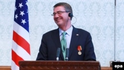 U.S. Defense Secretary Ash Carter speaks during a news conference in Kabul, Afghanistan, on December 9.