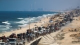 Displaced Palestinians move southward after Israeli forces ordered residents of Gaza City to evacuate to the south