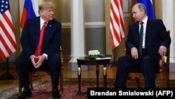 Russian President Vladimir Putin (right) and U.S. President Donald Trump (left) last met in a one-on-one setting in Helsinki in July 2018. (file photo)