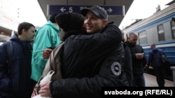 Dzmitry Paliyenka was greeted by family and friends at the main railway station in Minsk on October 24.