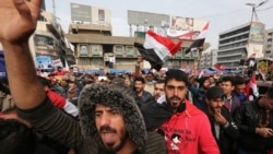 Iraqis gather at Tahrir square in the capital Baghdad amid ongoing anti-government protests on December 10, 2019