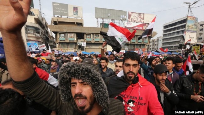 Iraqis gather at Tahrir square in the capital Baghdad amid ongoing anti-government protests on December 10, 2019