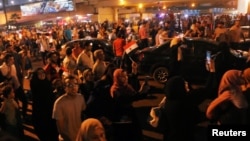 People gather in Cairo's Tahrir Square on September 20 as part of antigovernment protests.