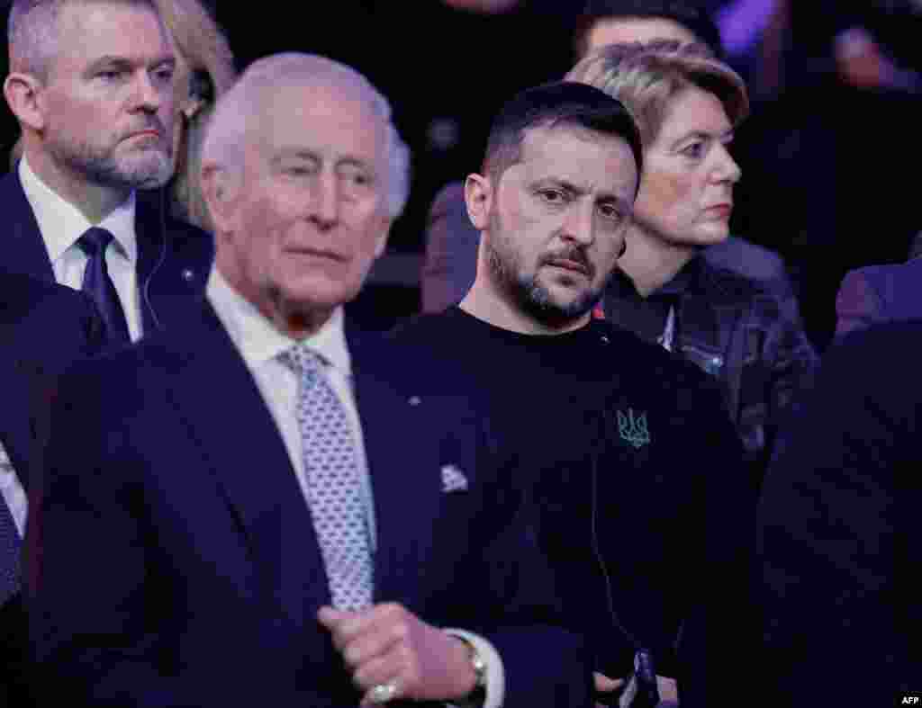 Regele Charles al Marii Britanii și președintele ucrainean Volodimir Zelenski, la ceremonia de la Oswiecim, Polonia.