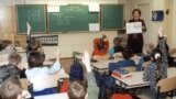 Latvia -- Pupils of the 2nd grade in the secondary school N 5 of Riga having classes of maths both in Russian and Latvian. 