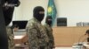 Fourteen Kazakhs Returned From Syria On Trial On Terrorism Charges