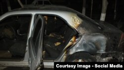 Armenia -- The cars of an opposition activist pictured after an arson attack in Yerevan, 27Nov2014