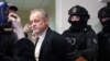 Vladimir Plahotniuc appears in court in Chisinau for the first time on December 2, 2025.