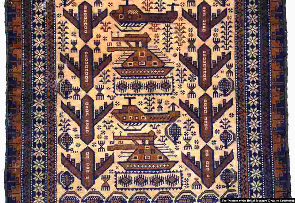 A detail of a rug made in the 1980s depicting tanks, bombers, helicopters, and hand grenades. The rugs are woven from sheep wool either by factory workers or in village homes by women who weave between their housework. A medium-sized rug can take a mother and daughter team around six weeks to complete.