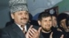 Akhmad Kadyrov (left) and his son Ramzan in March 2004
