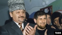 Akhmad Kadyrov (left) and his son Ramzan in March 2004