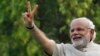 Narendra Modi, the prime ministerial candidate for India's main opposition Bharatiya Janata Party (BJP), gestures during a public meeting in Vadodra, in the western Indian state of Gujarat, on May 16.