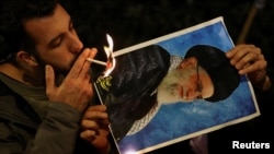 Protest outside the Iranian embassy in support of nationwide protests in Iran, in London
