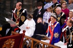 Prvi red, slijeva nadesno: princ Vilijam, princeza Šarlot, princ Luis, princeza od Velsa Kejt i vojvoda od Edinburga, princ Edvard, na ceremoniji krunisanja kralja Čarlsa III, London, 6. maj 2023.