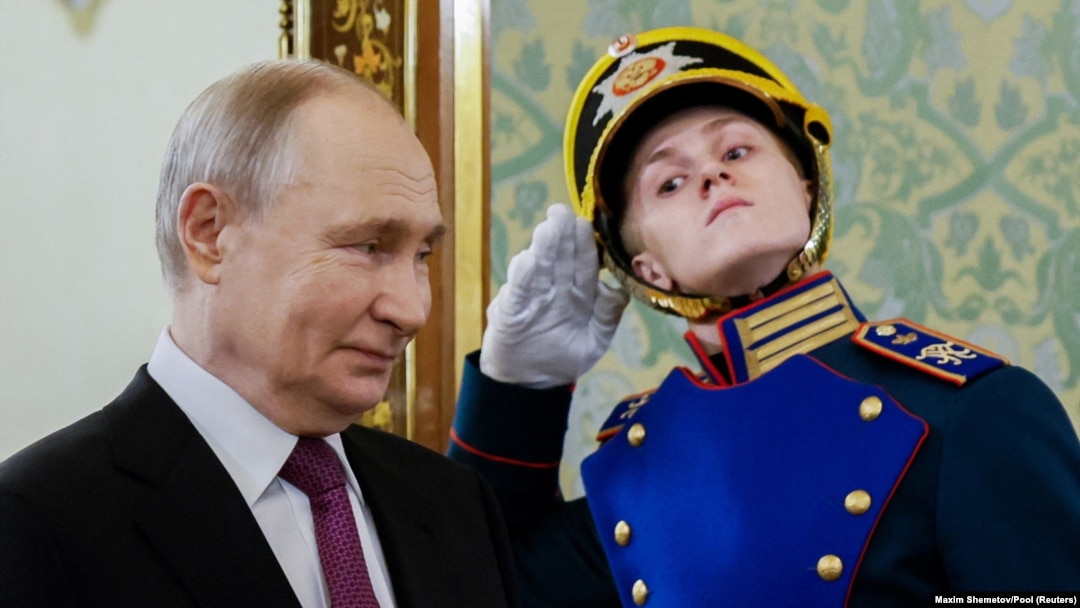  Russia's President Vladimir Putin walks before a press conference in Moscow on March 13. 