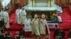 POPE-IRAQ/Pope Francis walks during a mass at the Chaldean Cathedral of "Saint Joseph" in Baghdad, Iraq March 6, 2021. 