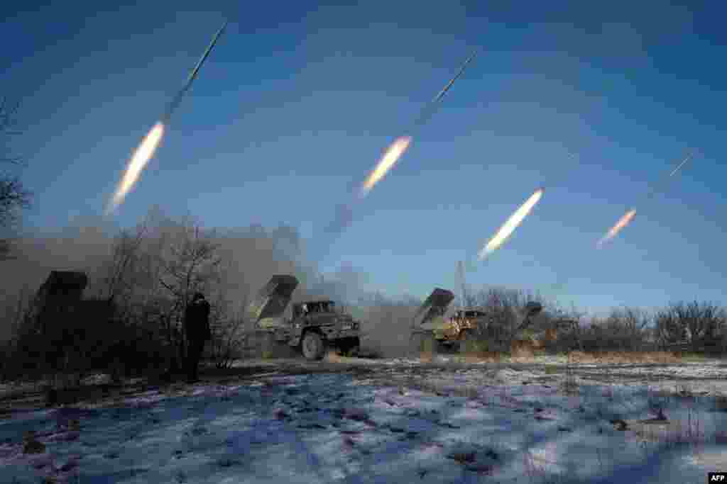 Pro-Russian rebels stationed in the eastern Ukrainian city of Horlivka launch missiles from Grad launch vehicles. (AFP/Andrei Borodulin)