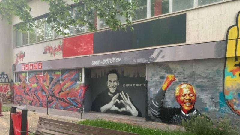 Байден а, Путин а цхьаьнакхетачу юкъанна Женевехь Навальныйн граффити йина
