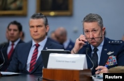 US Secretary of Defense Pete Hegseth (left) and Chairman of the Joint Chiefs of Staff General Dan Caine attend a House Appropriations Subcommittee on Defense hearing on Capitol Hill in Washington on May 12.