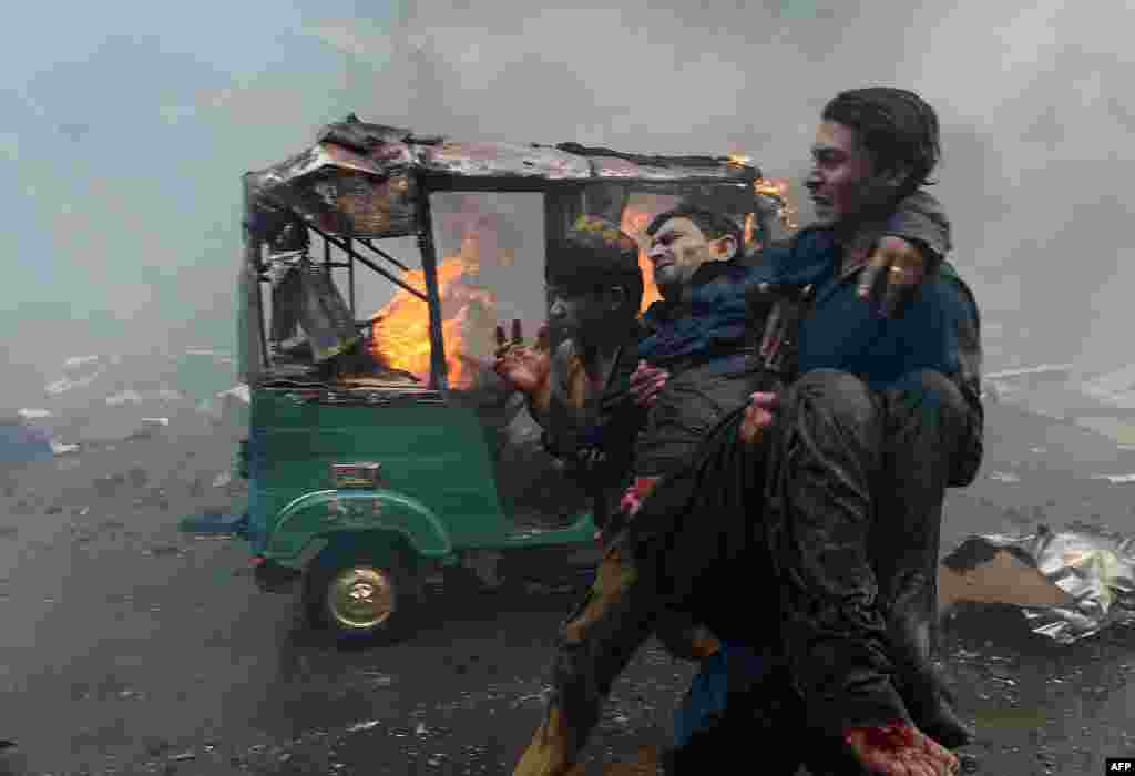 With ambulances slow to respond, many of those injured in the blast had to be carried out by rescue workers and local residents. 