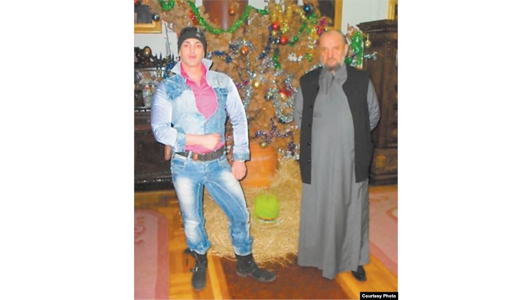 Bishop Kacavenda poses with Belgrade stripper Dejan Nestorovic