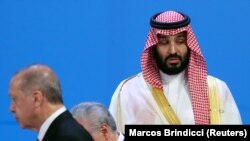 ARGENTINA -- Turkish President Tayyip Erdogan and Saudi Arabia's Crown Prince Mohammed bin Salman are seen during the G20 summit in Buenos Aires, November 30, 2018